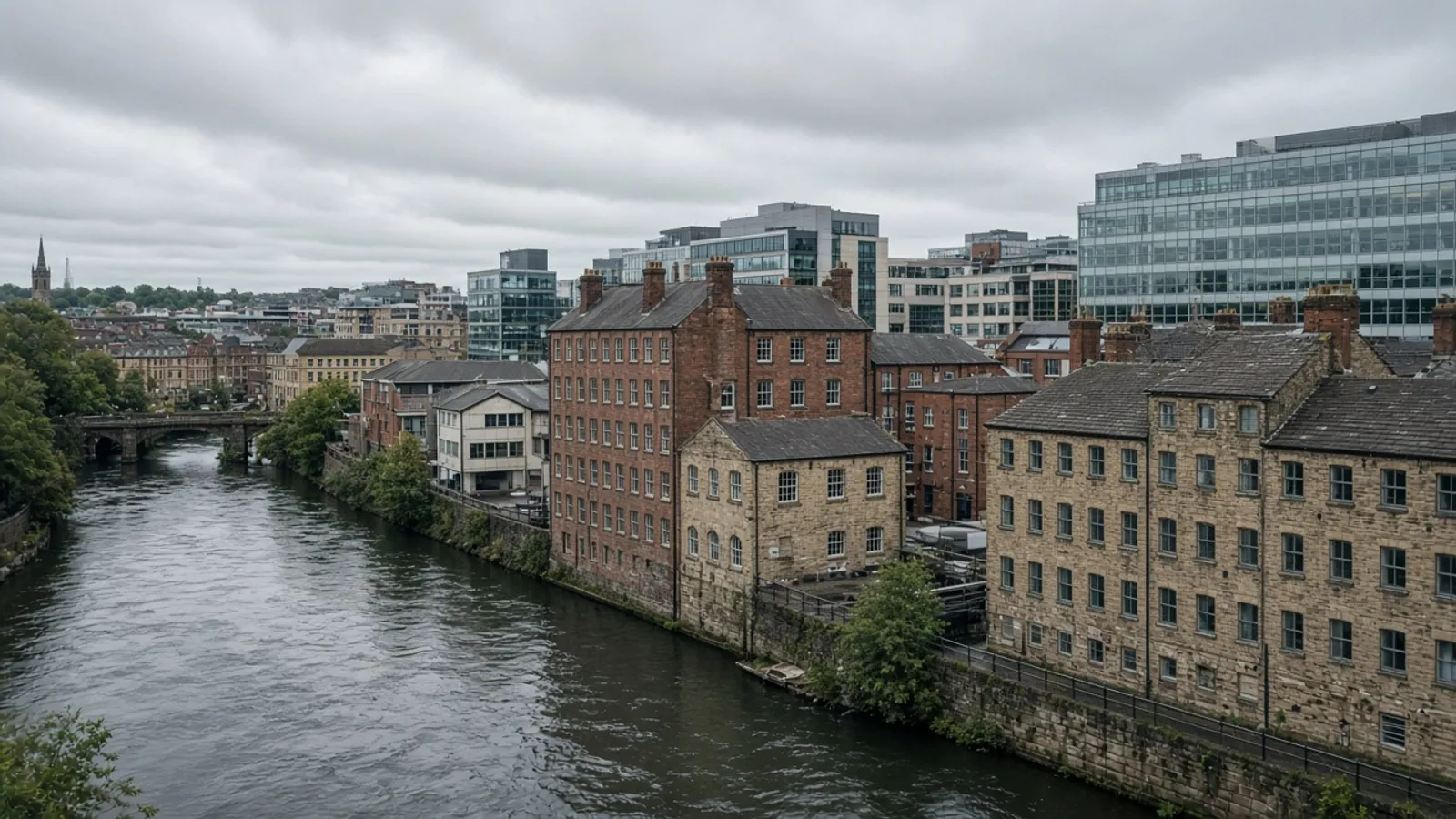 Leeds riverside mills and contemporary offices under a pale Yorkshire sky